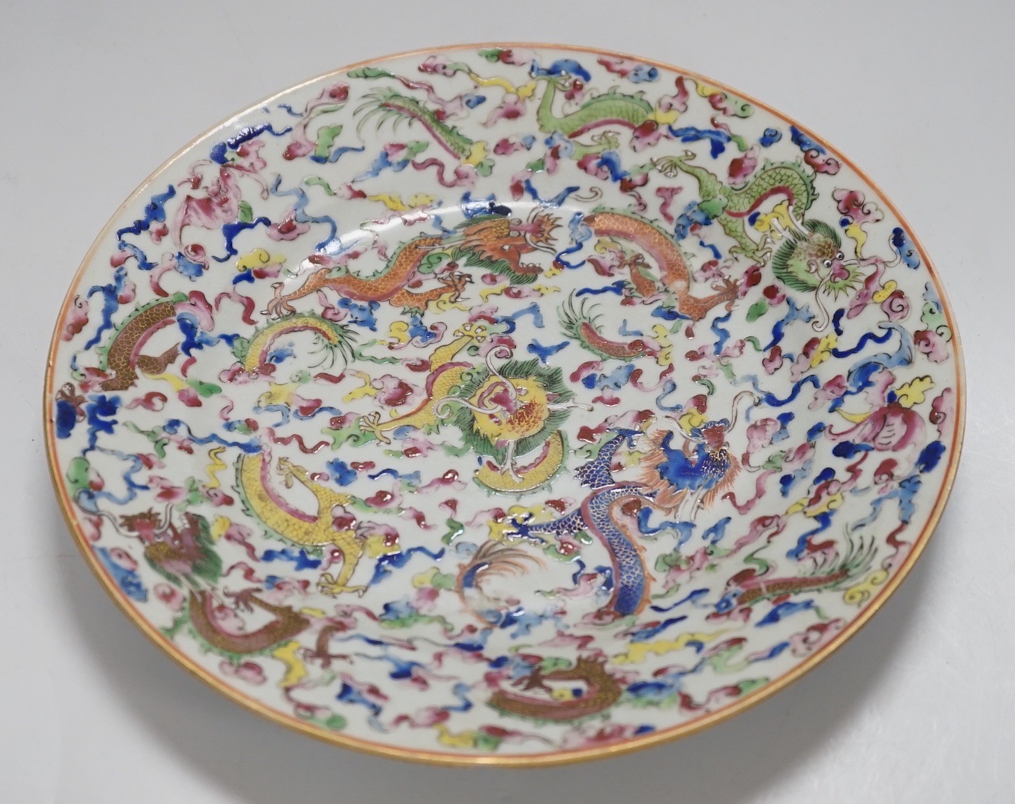 A 19th century Chinese enamelled porcelain ‘dragon’ plate, 23cm